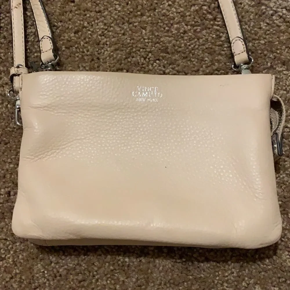 Vince Camuto soft pink crossbody wristlet.